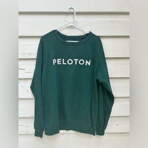Peloton green sweatshirt.